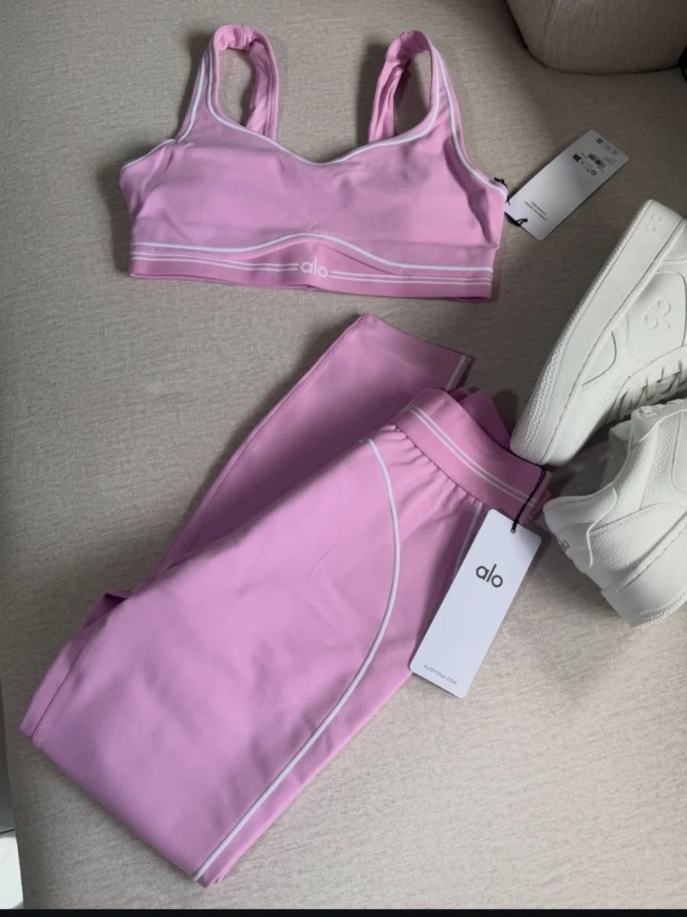 ALO Yoga Light Pink Racerback Sports Bra with White Piping